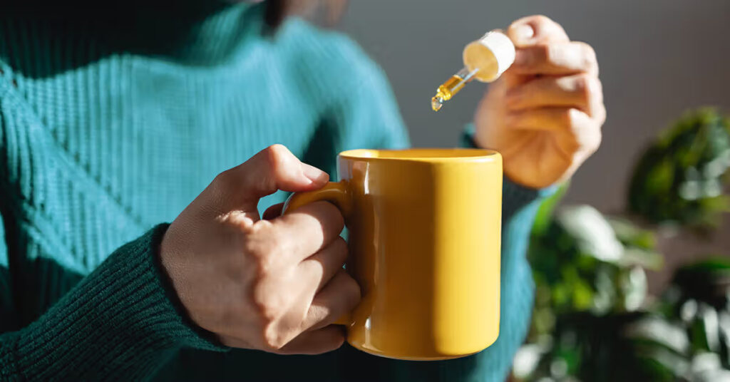 female-cbd-oil-dropper-coffee